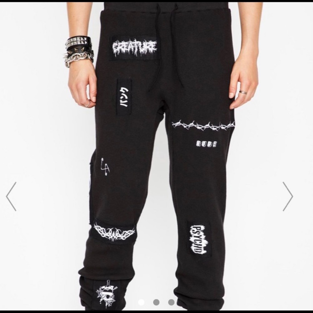 Dolls Kill thermal printed black pants